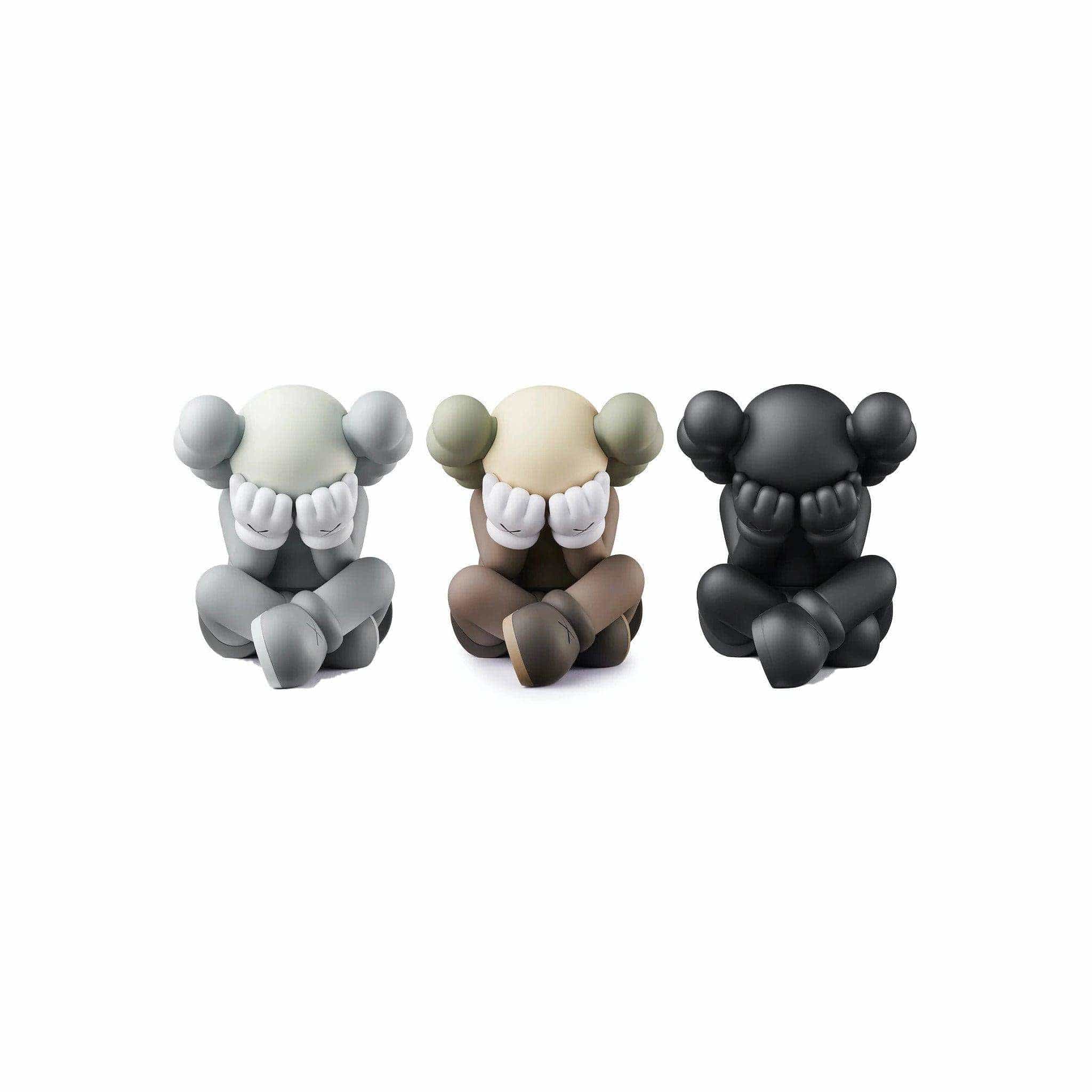 KAWS Separated Vinyl Figure Set | Common Hype