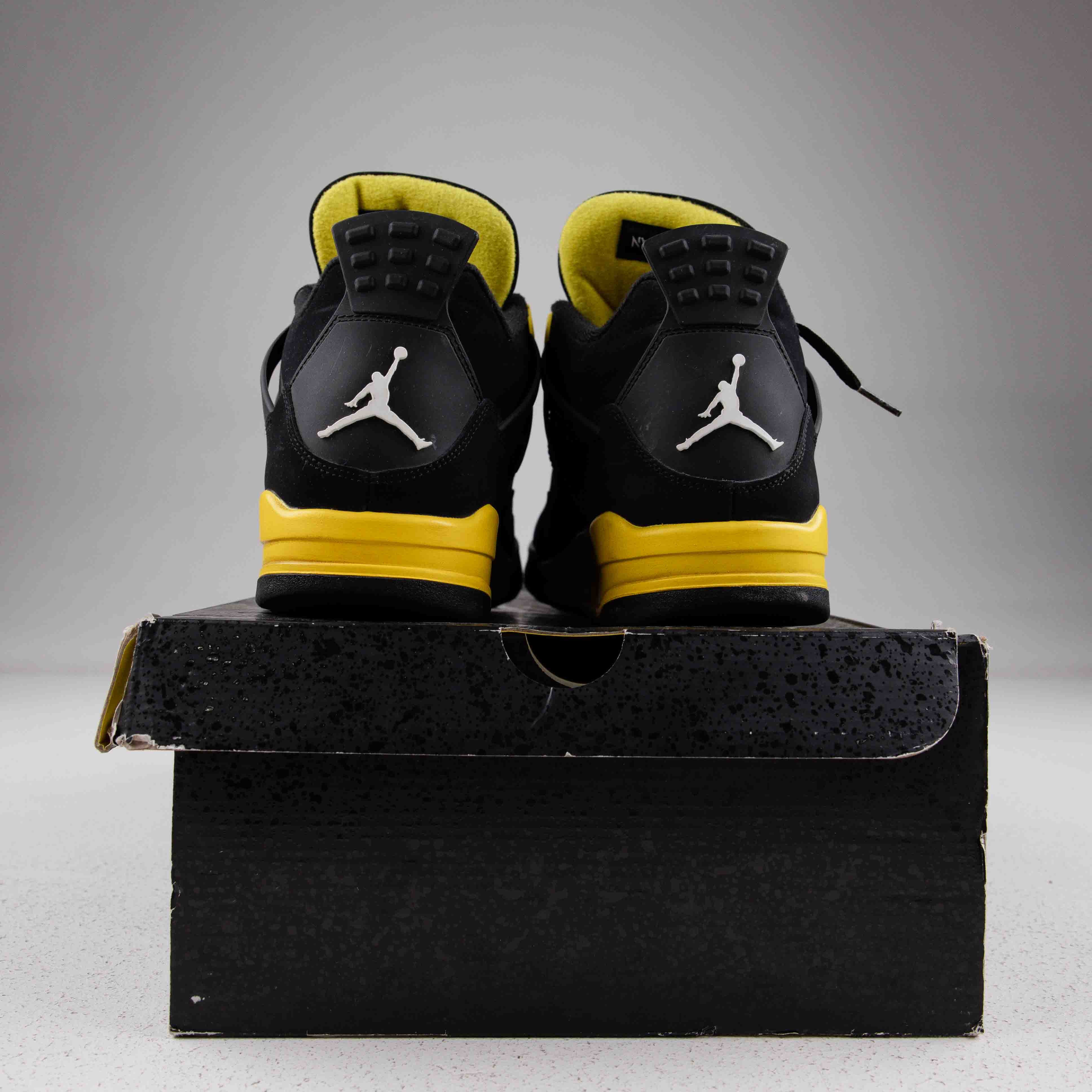 Jordan 4 Retro Thunder (2023) - Used - 3601
