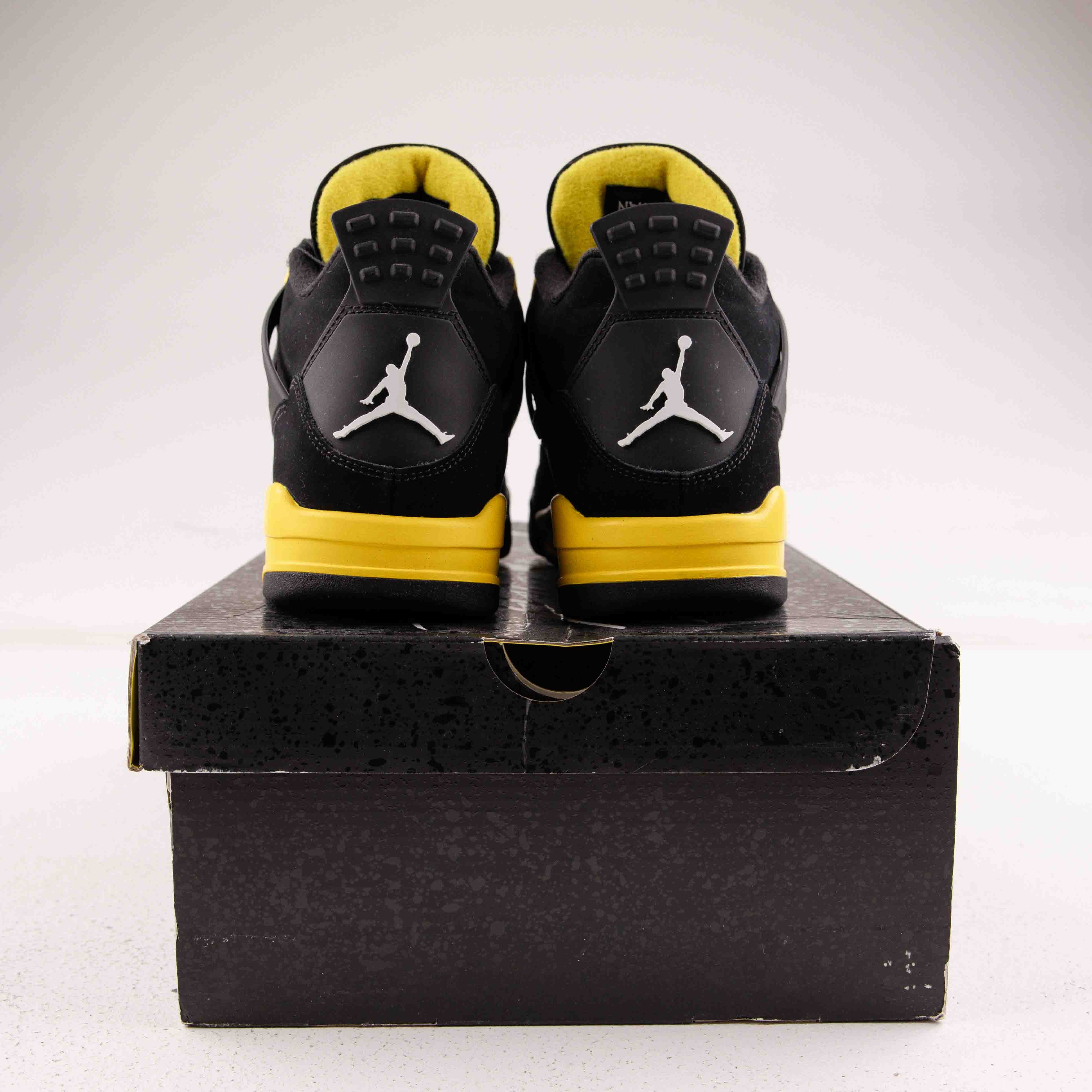 Jordan 4 Retro Thunder (2023) - Used - 4076
