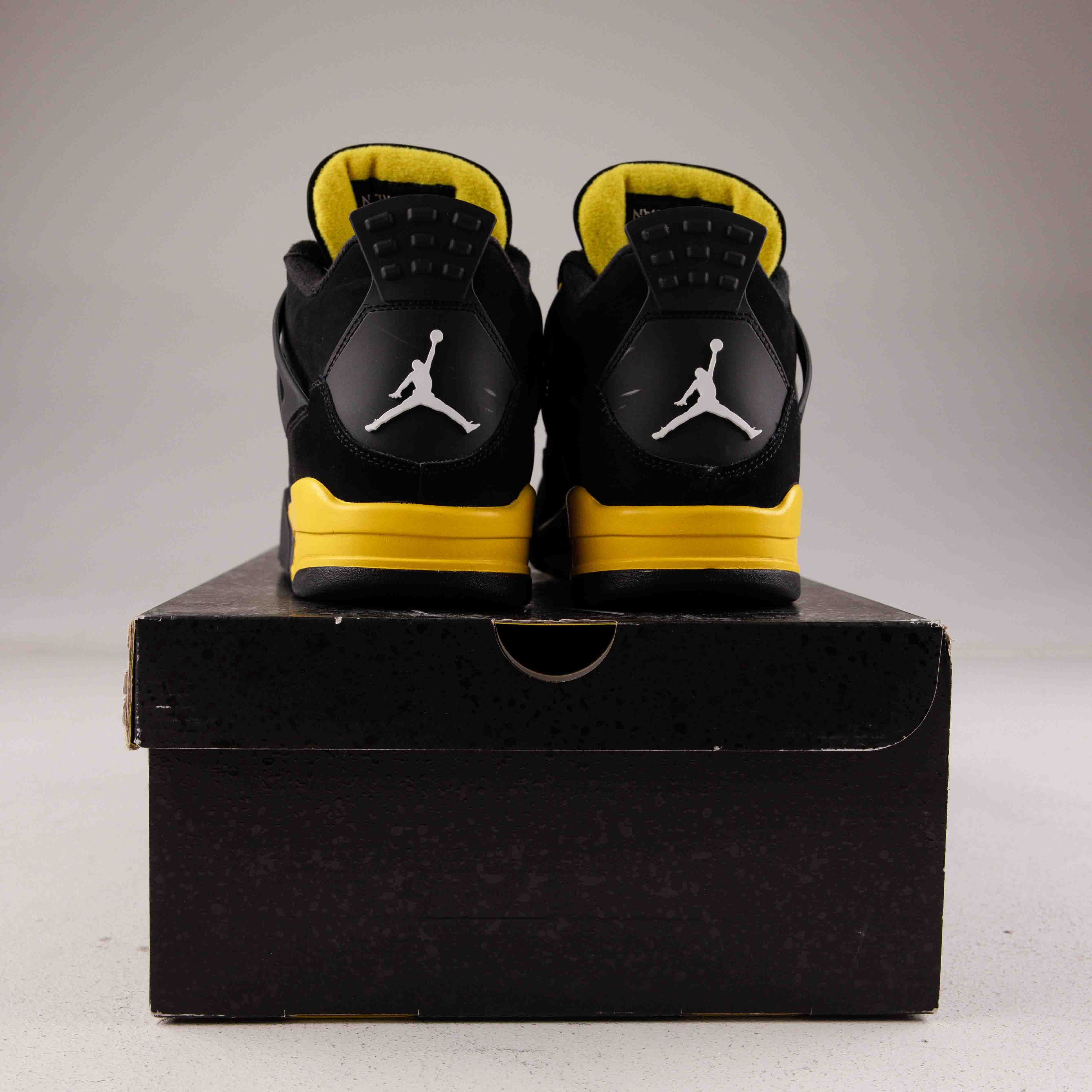 Jordan 4 Retro Thunder (2023) - Used - 4098