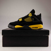 Jordan 4 Retro Thunder (2023) - Used - 4098