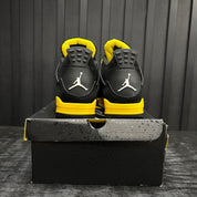 Jordan 4 Retro Thunder (2023) - Used - 3918