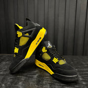 Jordan 4 Retro Thunder (2023) - Used - 1893