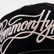 Common Hype Rhinestone Script Hat Black/Cream