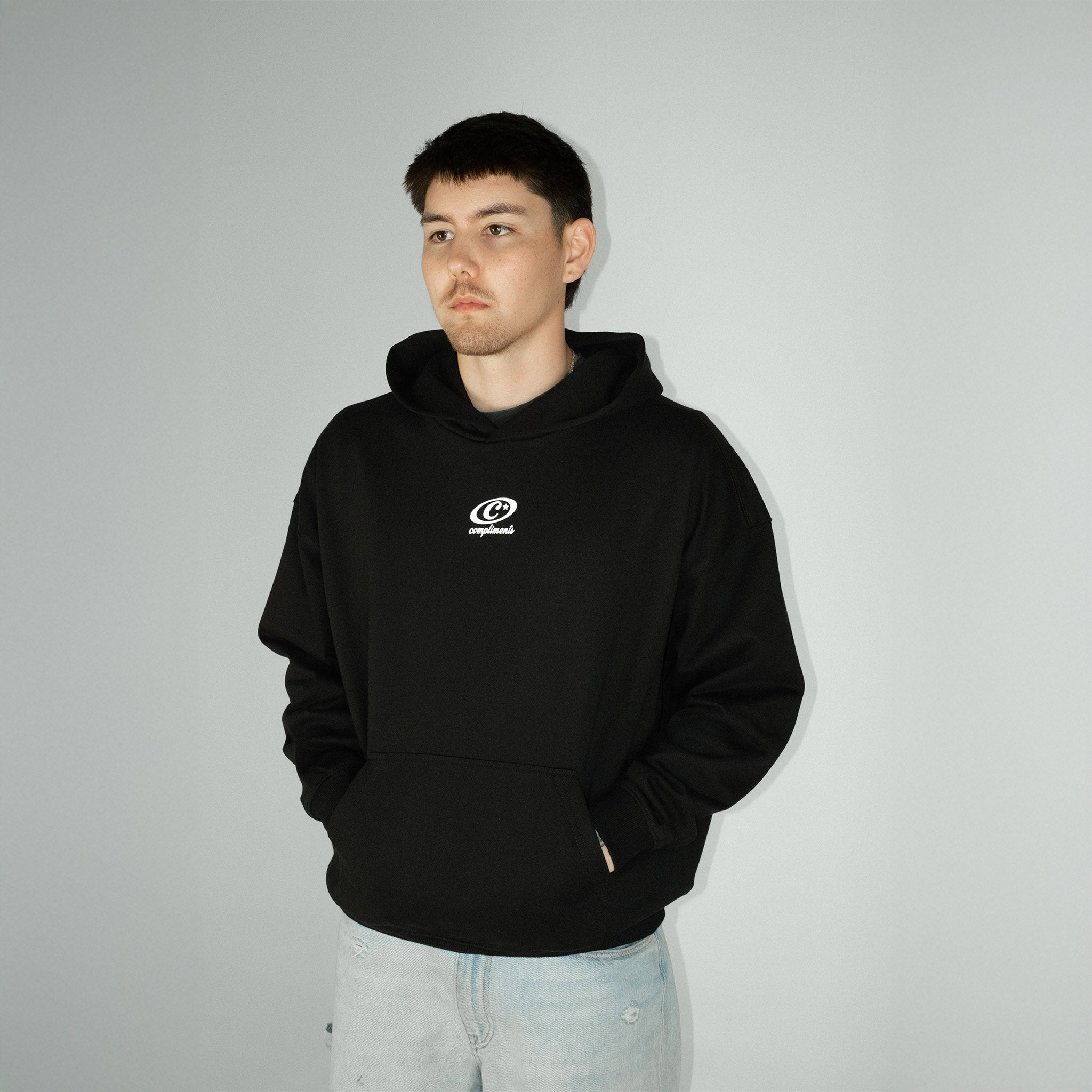 Compliments The World Better With You in It Black Hoodie - Common Hype